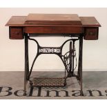 ‘Singer’ an early 20th century treadle powered sewing table