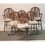 A set of six wheel-back dining chairs
