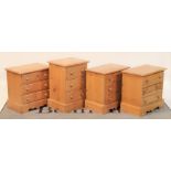 A set of three modern pine bedside chests