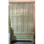 Laura Ashley a modern cream painted two door wardrobe with single drawer base