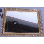 A modern gilt framed mirror