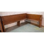 An early 20th century pine corner pew bench