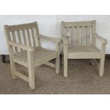 A pair of modern grey painted hardwood garden open armchairs