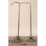 A pair of early 20th century French brass standard lamps
