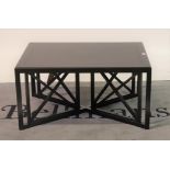 A 20th century ebonised rectangular coffee table