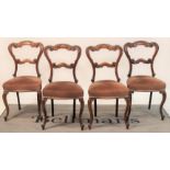 A set of four Victorian rosewood dining chairs