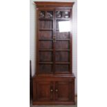 An early 20th century oak display cabinet