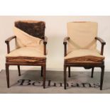 A pair of mid-20th century Chinese hardwood open armchairs