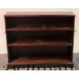 A modern mahogany floor standing open bookcase with three shelves.