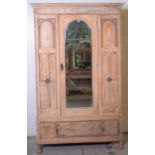 An early 20th century oak wardrobe