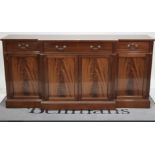 A George III style mahogany break front sideboard