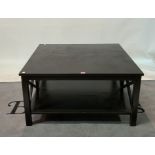 A modern black painted hardwood square two tier coffee table