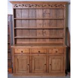 An early 20th century pine kitchen dresser