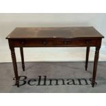 A 19th century mahogany two drawer writing table