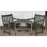 A pair of modern hardwood garden open armchairs and matching occasional table