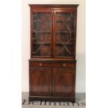 A George III style mahogany bookcase cabinet