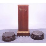 A Victorian style oak pedestal