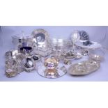 Silver plated items, including a cocktail shaker, wine coasters, an inkwell, trays dishes and...