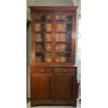 A George III style mahogany bookcase cabinet