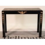 An early 20th century ebonised console table