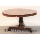 A Regency rosewood circular snap top centre table