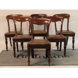 A set of six Victorian mahogany bar back dining chairs