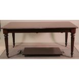 A Regency style mahogany extending dining table