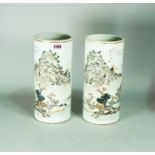 A pair of Chinese porcelain cylindrical vases