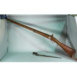 An early 20th century percussion action rifle and Bayonet, possibly converted from a flintlock...