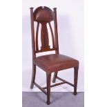 Two early 20th century oak side chairs