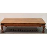 A modern hardwood rectangular coffee table