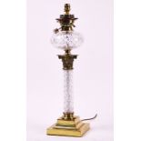 A LATE VICTORIAN BRASS AND GLASS CORINTHIAN COLUMN TABLE LAMP