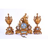 A FRENCH GILT-METAL AND SEVRES-STYLE PORCELAIN CLOCK GARNITURE