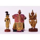 A GROUP OF FOUR SOUTH-EAST ASIAN FIGURES AND A PAIR OF GILT LACQUER SCROLL HOLDERS (6)