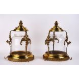 A PAIR OF GILT BRASS WINGED GRIFFIN HALL LANTERNS (2)