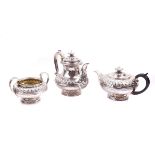 A SILVER COMPOSITE FOUR PIECE TEA SET