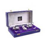 A SILVER MIXED CONDIMENTS SET