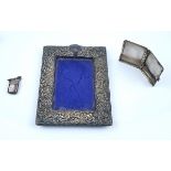 A SILVER MOUNTED RECTANGULAR PHOTOGRAPH FRAME AND TWO FURTHER ITEMS (3)