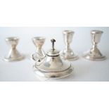 A SILVER CIGAR LIGHTER AND TWO PAIRS OF CANDLESTICKS (3)