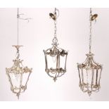 THREE SILVERED-METAL AND GLASS TAPERING HALL LANTERNS (3)