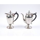 A SILVER TWO PIECE CAFE AU LAIT SET