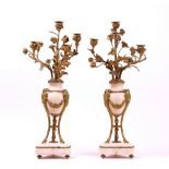 A PAIR OF FRENCH LOUIS XVI STYLE ORMOLU AND MARBLE MOUNTED FOUR-LIGHT CANDELABRA (2)