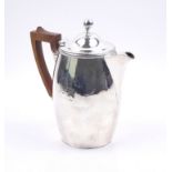 A GEORGE III SILVER COFFEE JUG