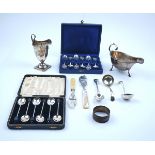 A SILVER SAUCEBOAT AND FURTHER MOSTLY SILVER ITEMS (10)