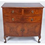 AN EDWARDIAN WALNUT SIDE CUPBOARD