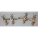 A PAIR OF LATE VICTORIAN BRASS TAPS (4)