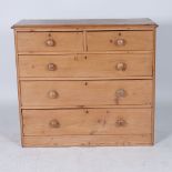 A VICTORIAN PINE CHEST OF DRAWERS