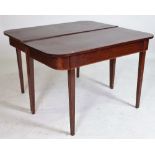 A George III mahogany D-end dining table