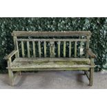 AN EARLY 20TH CENTURY HARDWOOD GARDEN BENCH