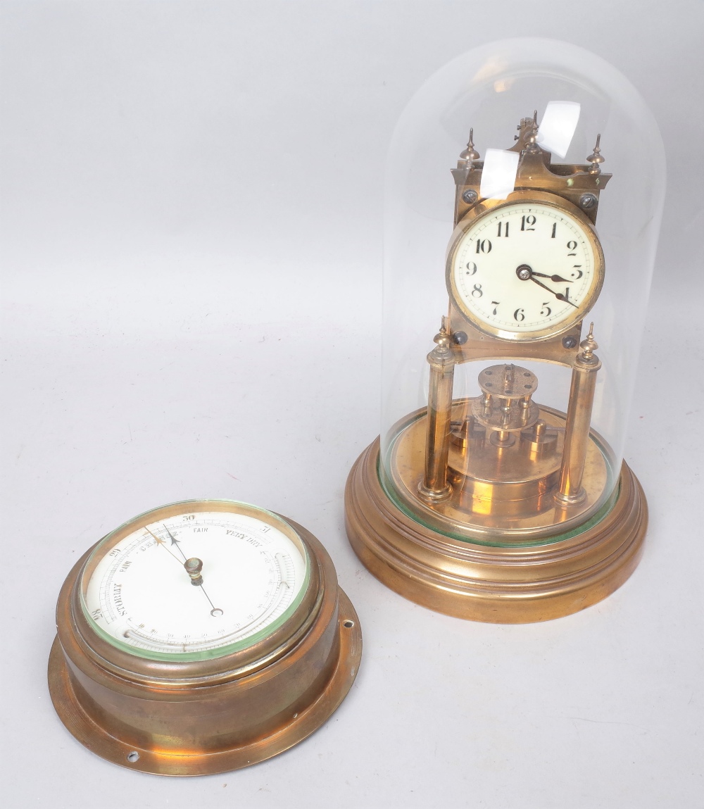 A BRASS SKELETON CLOCK AND A BAROMETER (2)